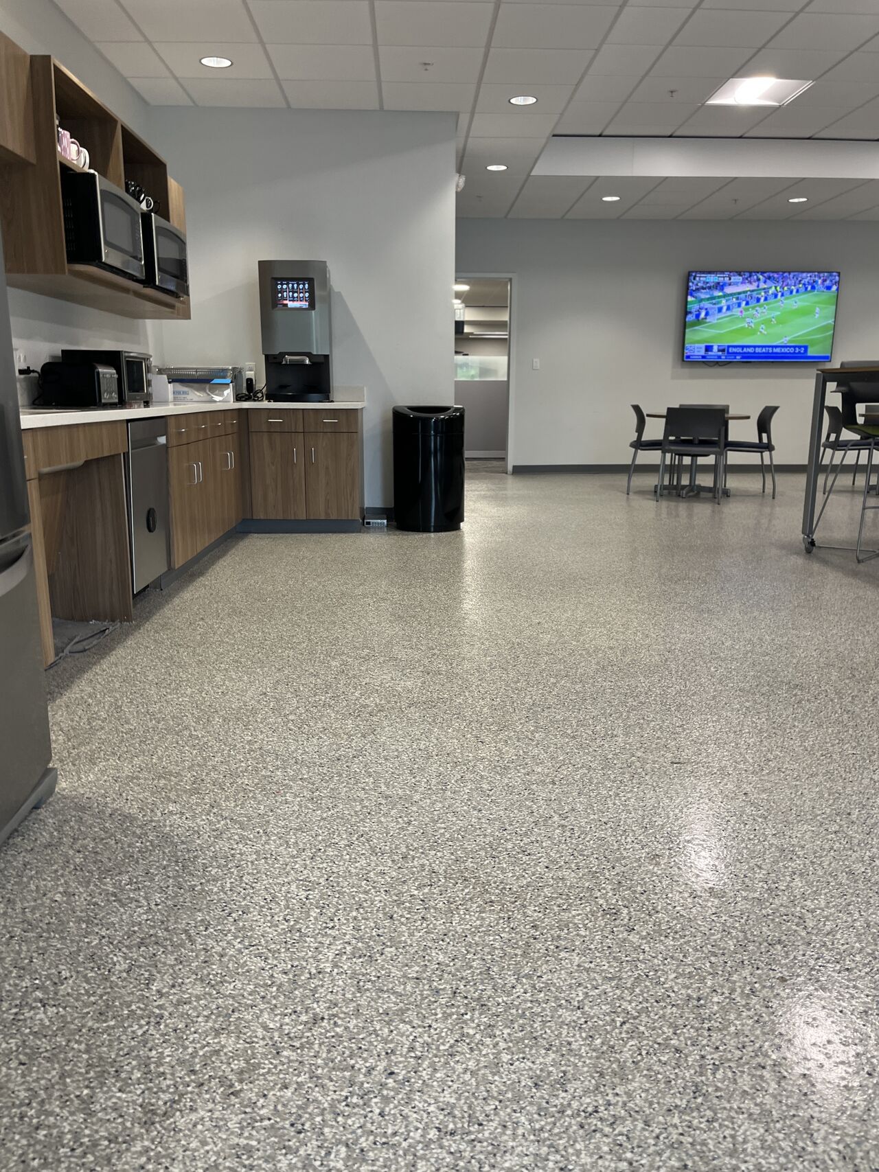 Completed epoxy flake commercial flooring in Canada