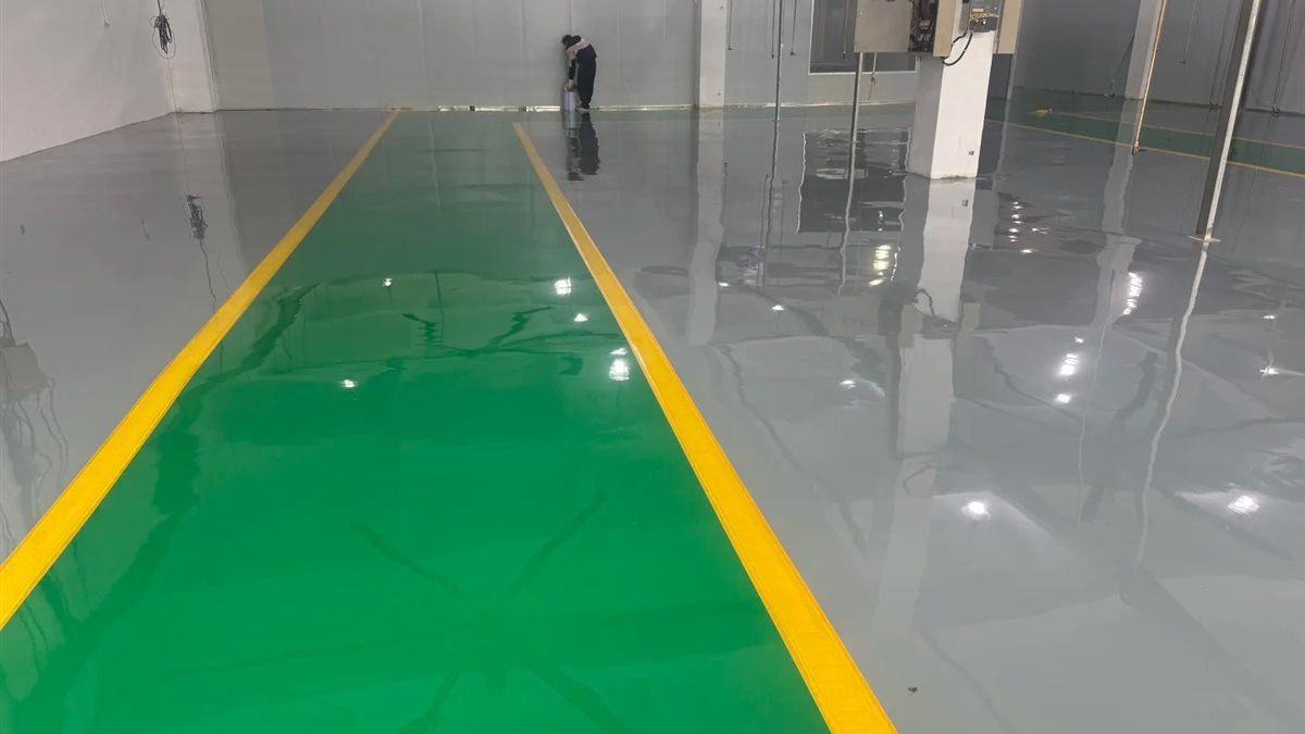 Completed glossy epoxy flooring in manufacturing facility